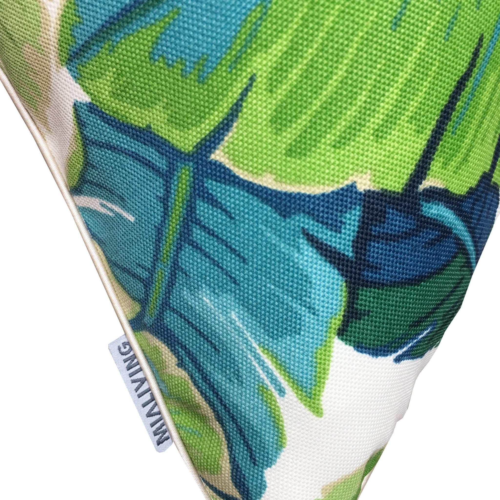 Poduszka dekoracyjna Bahama Blue w zielone liście bananowca THE HOMECEPT